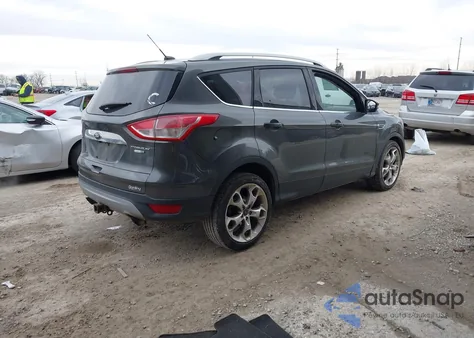 2015 Ford Escape Titanium z USA, uszkodzony, nr VIN 1FMCU9J93FUB27129